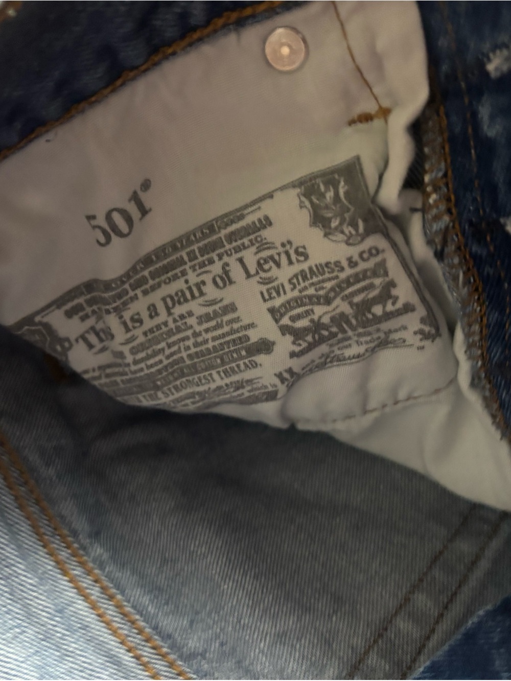 Levi's Medium Blue Denim Cutoff Shorts with Frayed Hem - Picture 3 of 5